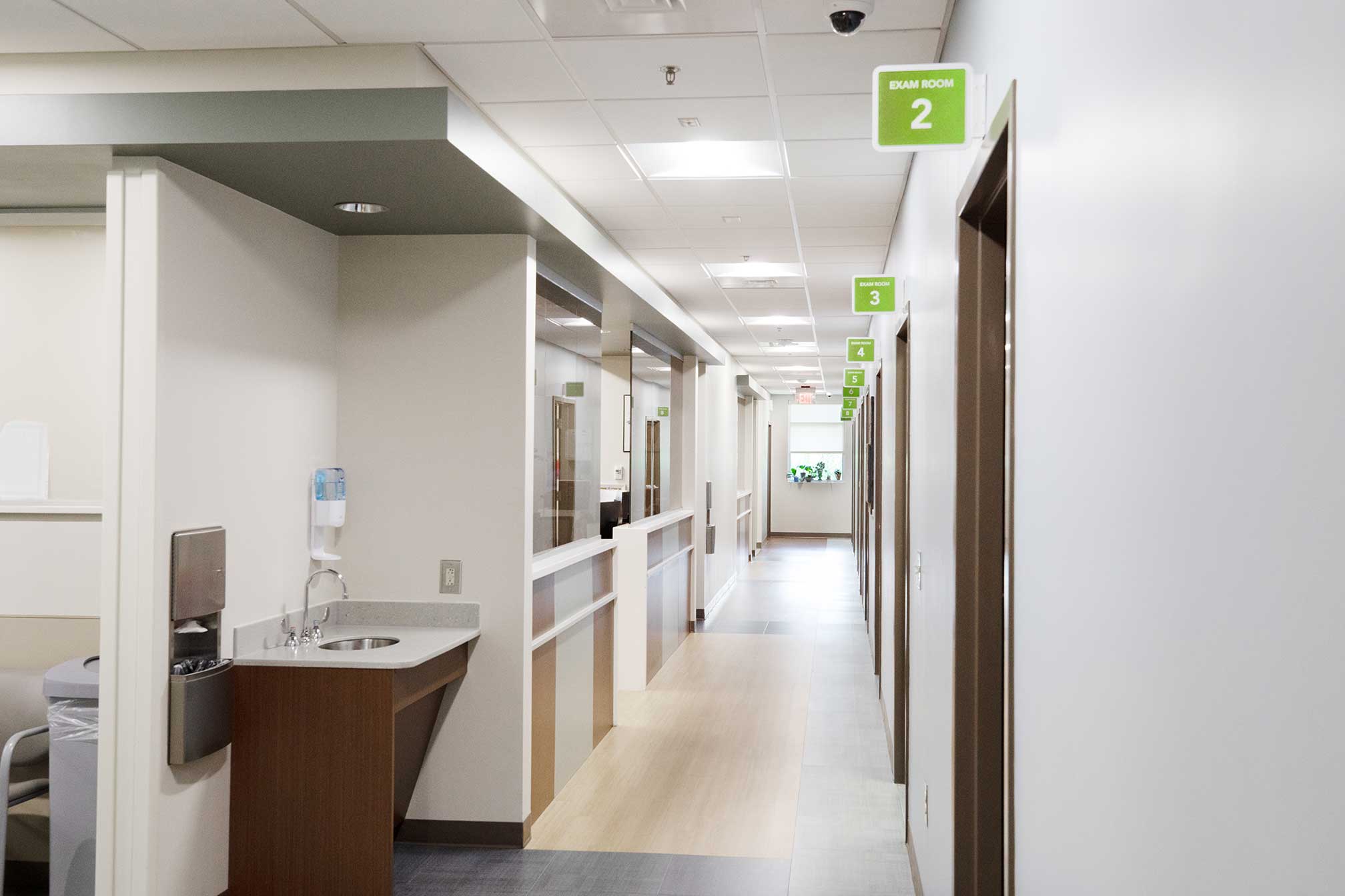 Hallway showing numbered exam rooms at Affinity Health Center.